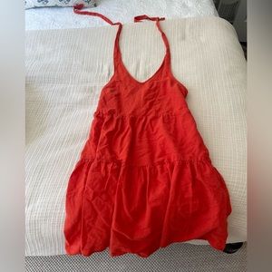 Orange halter dress.